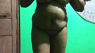 Is this wife masturbating with a cucumber?