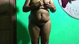 Is this wife masturbating with a cucumber?