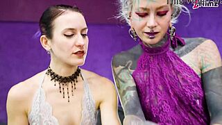  Tattooed sub gets roughed up and pegged hard by two dominas