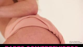 Leony April Teases Natural Tits In Classy Display