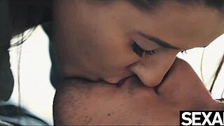 cute couple warms up with intimate touches on snowy day