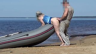 Lady tourist strips naked with boatman on public beach