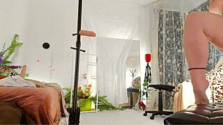 look at that curvy milf oiling her big ass and tits on voyeur cam