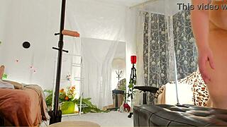 look at that curvy milf oiling her big ass and tits on voyeur cam