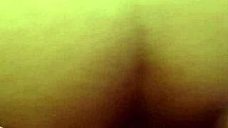 The black top cums on the white bottom's ass during interracial encounter.