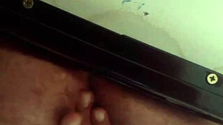 A gay stud enjoys close-up anal play with big dildos, leading to lactation