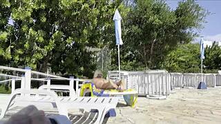 she noticed i was jerking off and helped me cum next to the public pool!