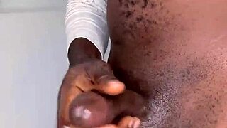 Watch this ninja man stroke his monster cock and cum?