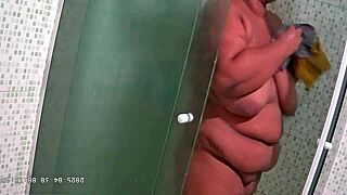 hidden camera captures CHUBBY STEPMOTHER in intimate moment