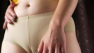 Just chilling with a camel toe tease in vintage panties.