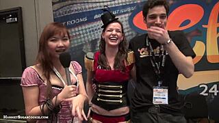 Fionna and Jimmy perform a Chaturbate video at the AE Expo with big tits