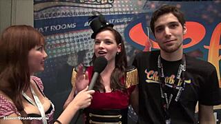 Fionna and Jimmy perform a Chaturbate video at the AE Expo with big tits
