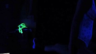 Carrie B Engages in Intense Blacklight Sex Scene, Sucking and Choking on Cock with Small Tits