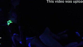 Carrie B Engages in Intense Blacklight Sex Scene, Sucking and Choking on Cock with Small Tits