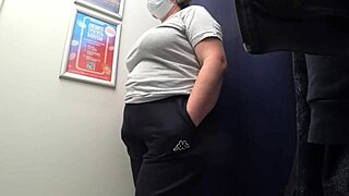 Look at this! Camera catches curvy milf's big ass in satin panties while changing in fitting room