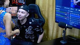 Belinha Baracho bends over on podcast table showing off her huge Brazilian ass.