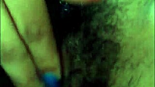 I watch her small tits while she masturbates passionately