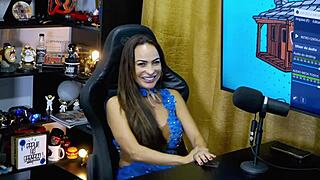 Belinha Baracho bends over on podcast table showing off her huge Brazilian ass.