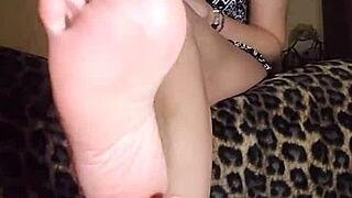 Slave worships mistress's socks and bare feet