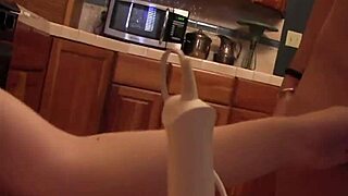 i watch these lesbians use sextoys in the kitchen, moaning to orgasm passionately.