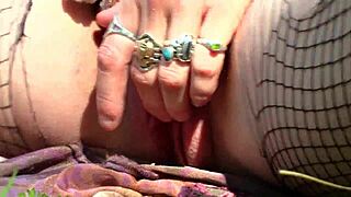 sweet babe fingers pussy with vibrator outdoors