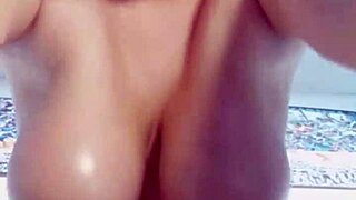 oiled chubby girl rides dildo with bouncing tits