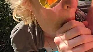 the wife gives a quick handjob to her husband while they're out on a walk