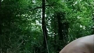 Slave F Humiliated in Forest with Handcuffs