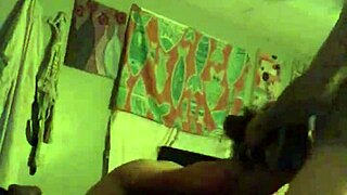 Two lovers engage in foreplay.