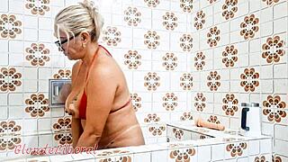 Blonde amateur uses toy in bathroom solo session.