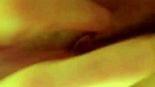 In the shower, she gets wet and starts touching herself sensually.