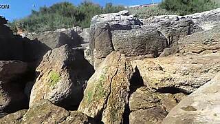 African nudist prostitute shows off her ass on the beach