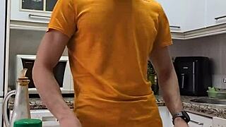 Pornstar undresses while cooking, masturbates, and cums on the food.