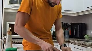 Pornstar undresses while cooking, masturbates, and cums on the food.