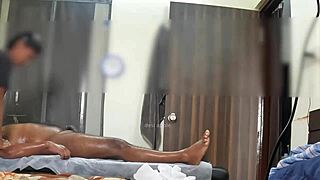 Hidden cam catches the masseuse giving a happy ending with her hands