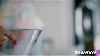 Two Girls Kissing in Kitchen