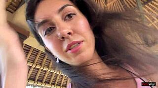 Skinny brunette flashes tight pussy in public cafe then gets facial from waiter.