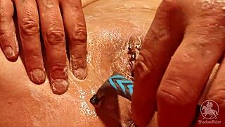 I'm shaving my smooth pussy lips in the bath right now!