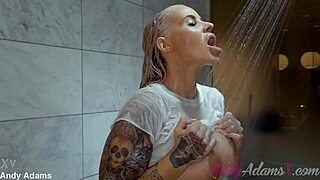 oh man, check out this busty blonde pornstar with huge tits soaking her wet tshirt in the shower