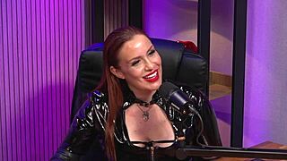 Isn't the redhead milf dominating as the ultimate BDSM queen in her leather corset?