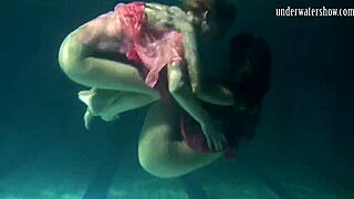 lilia mihalkova and natalia kupalka dive into underwater fun as russian lesbian babes in the pool.