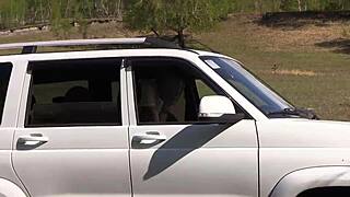 lesbians use a strapon to fuck in the car with big ass and hairy pussy in pov view