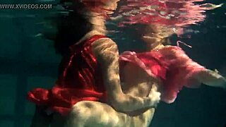 lilia mihalkova and natalia kupalka dive into underwater fun as russian lesbian babes in the pool.