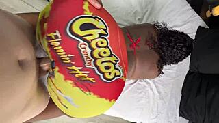 This white guy sneaks through a gloryhole to fuck a curvy black girl's big ass right in her tight yoga pants during an intense workout session.