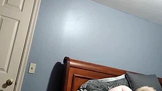 In a casual setting, chubby Marilyn explores pleasure with her favorite wand.