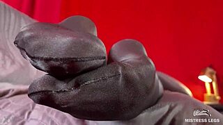 My long legs in anthracite nylon pantyhose tease with feet rubbing close up.