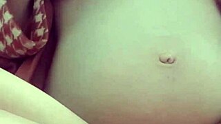 a pregnant milf indulges in solo masturbation play