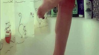 Why does this busty teen 18+ tease with perfect feet in steamy shower fetish play?