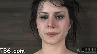 Whoa, check out this sexy beauty getting bound and whipped hard in femdom domination play