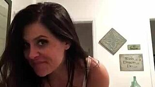 Tattooed milf amateur strips with big tits in homemade clothes-ripping tease